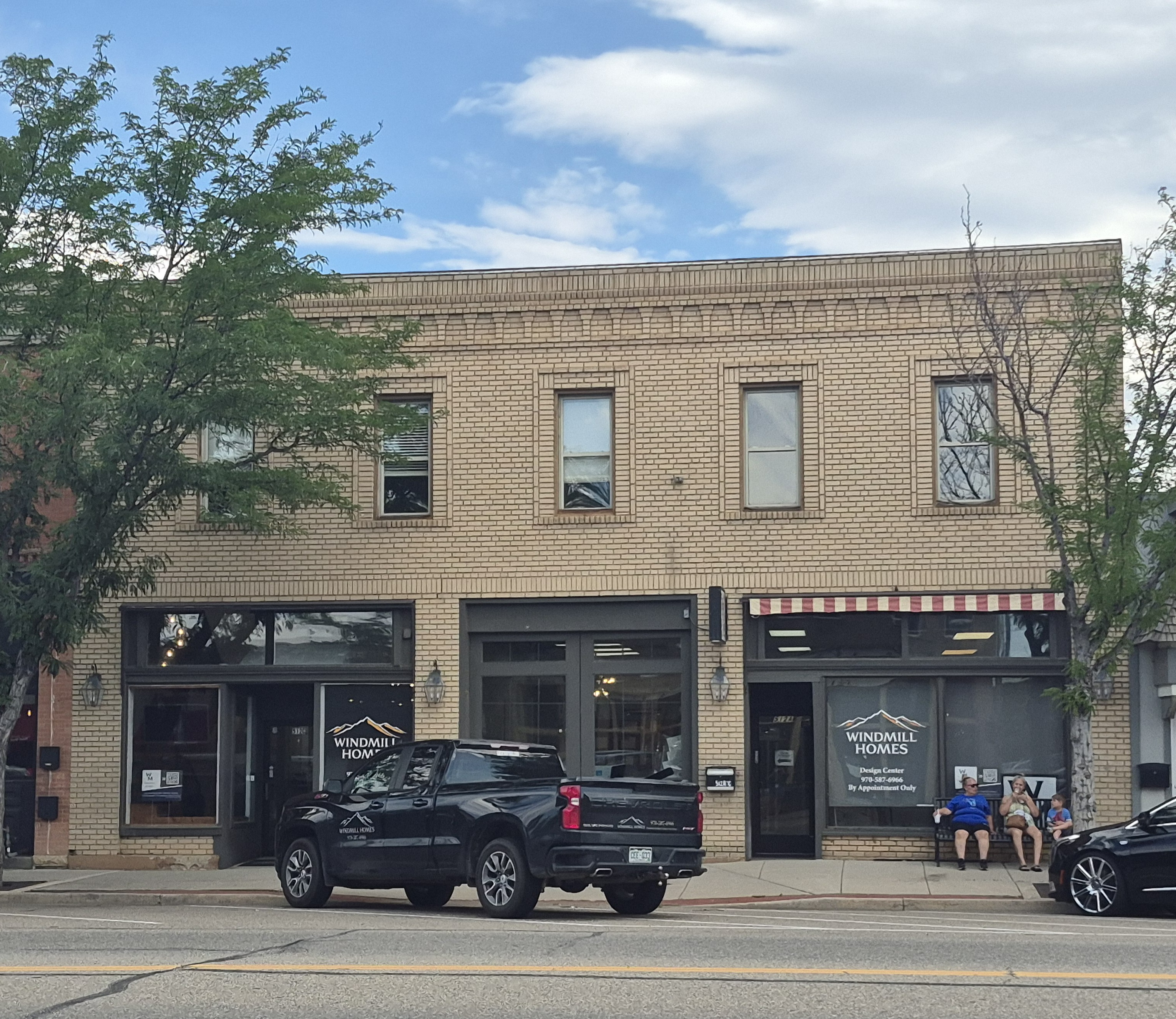 Color photograph of the front of a brick building.