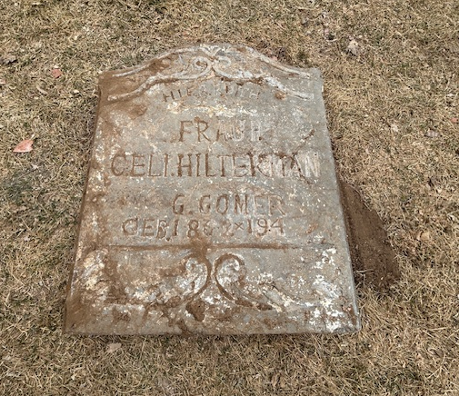 Color photograph of a headstone.