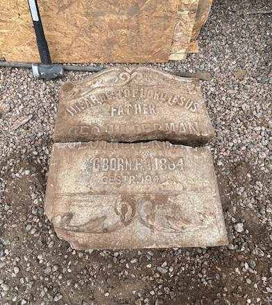 Color photograph of a headstone.